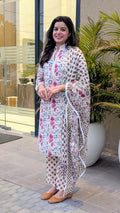 Woman wearing भू weave cotton 3pc kurta set , outdoor shoot
